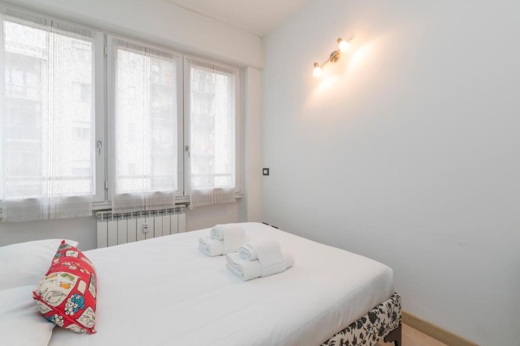 Posteľ alebo postele v izbe v ubytovaní [Luxury apartment near Bocconi] Zamenhof 7