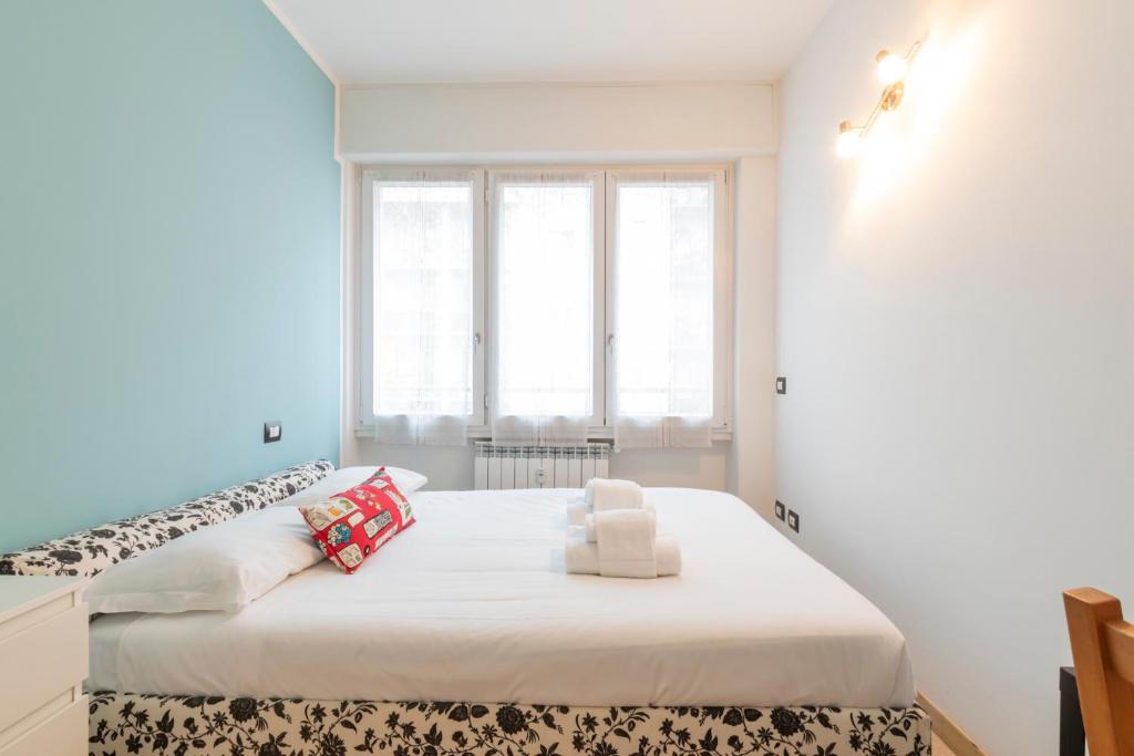 Posteľ alebo postele v izbe v ubytovaní [Luxury apartment near Bocconi] Zamenhof 7
