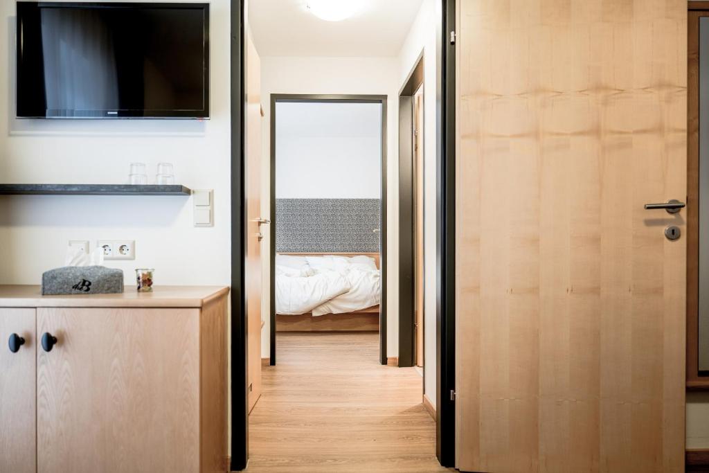 Postel nebo postele na pokoji v ubytování B&B Hotel DIE BARBARA