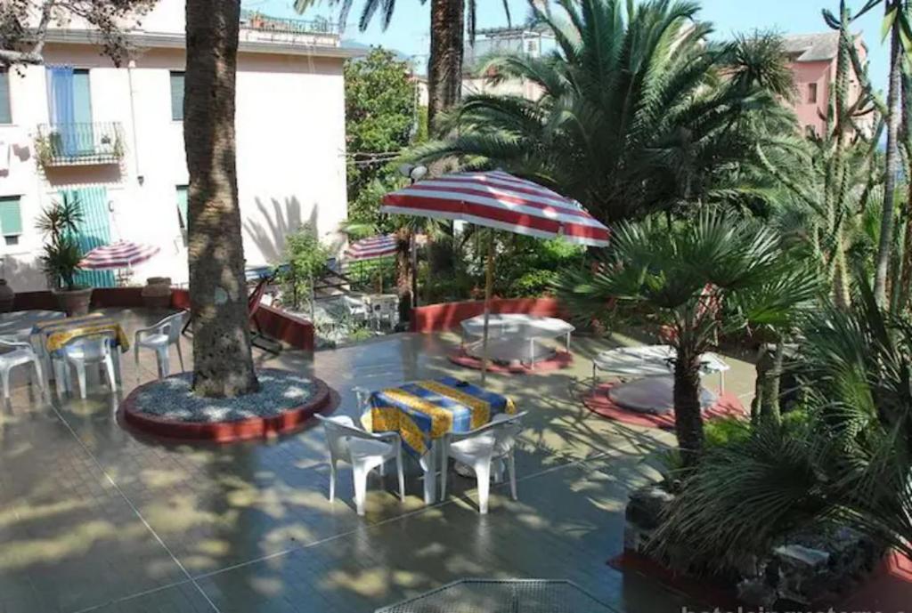 A garden outside Fegina 3 DELuxe Bedrooms & Bathrooms