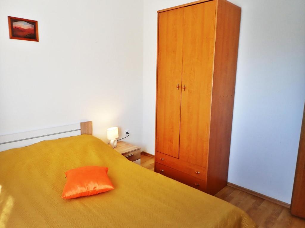 Postel nebo postele na pokoji v ubytování Apartment Putnik