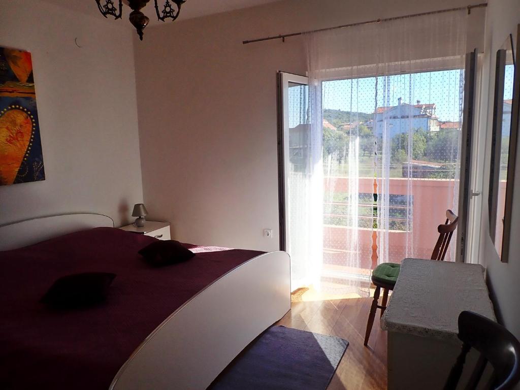 Postel nebo postele na pokoji v ubytování Apartment Putnik