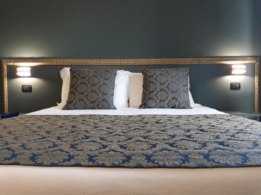 A bed or beds in a room at Resort Limax Acis