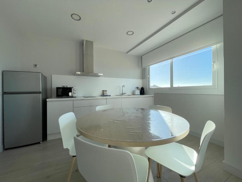 Кухня или мини-кухня в Apartaments Voramar Roses
