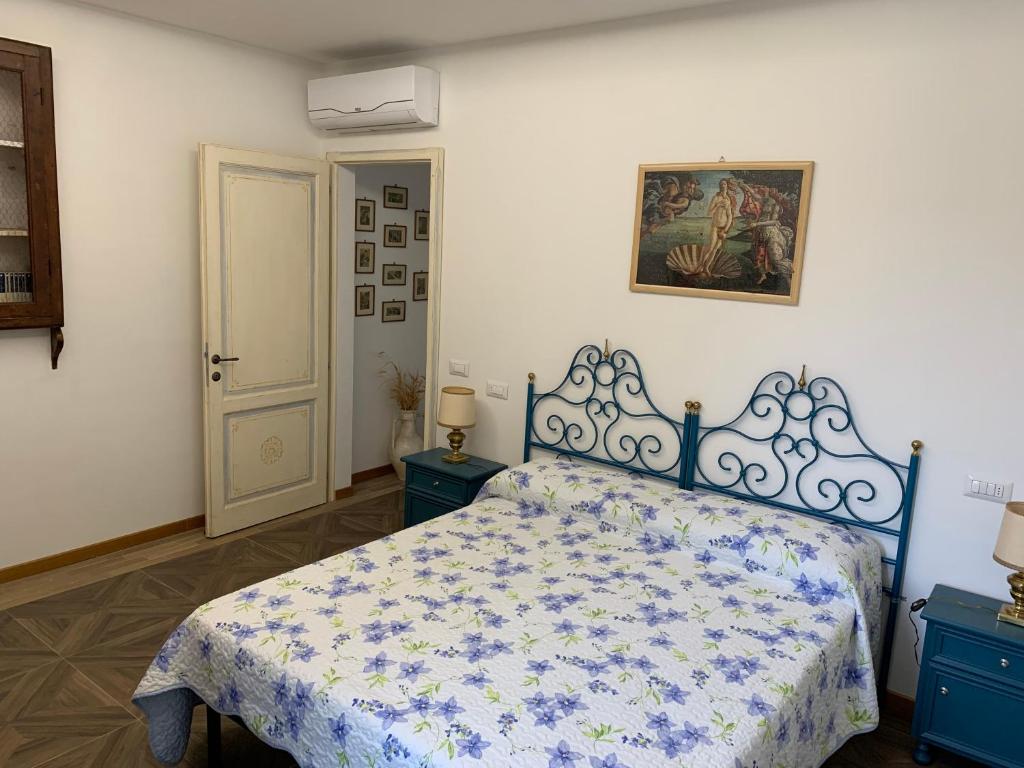 Łóżko lub łóżka w pokoju w obiekcie Villa Paglicci Reattelli Agriturismo