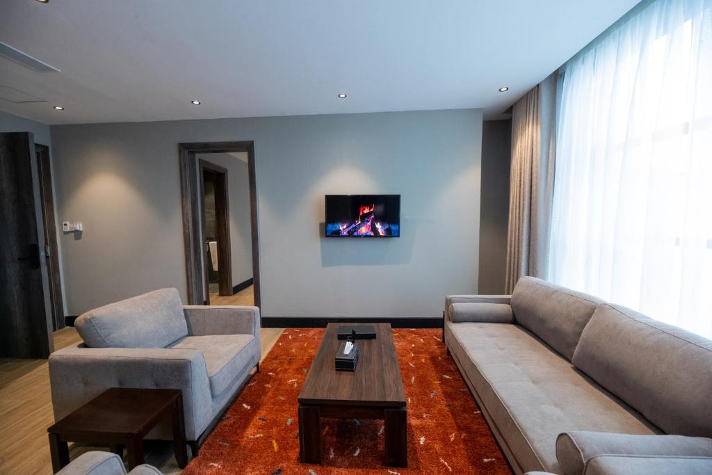 TV a/nebo společenská místnost v ubytování Sincerely Yours Suites & Serviced Apartments
