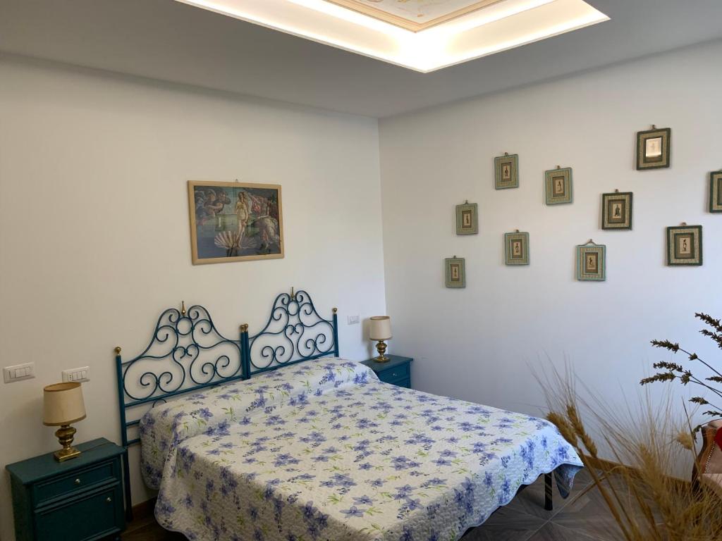 Łóżko lub łóżka w pokoju w obiekcie Villa Paglicci Reattelli Agriturismo