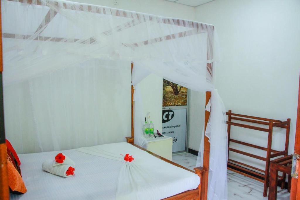 Postel nebo postele na pokoji v ubytování Galaxy View Homestay Sigiriya