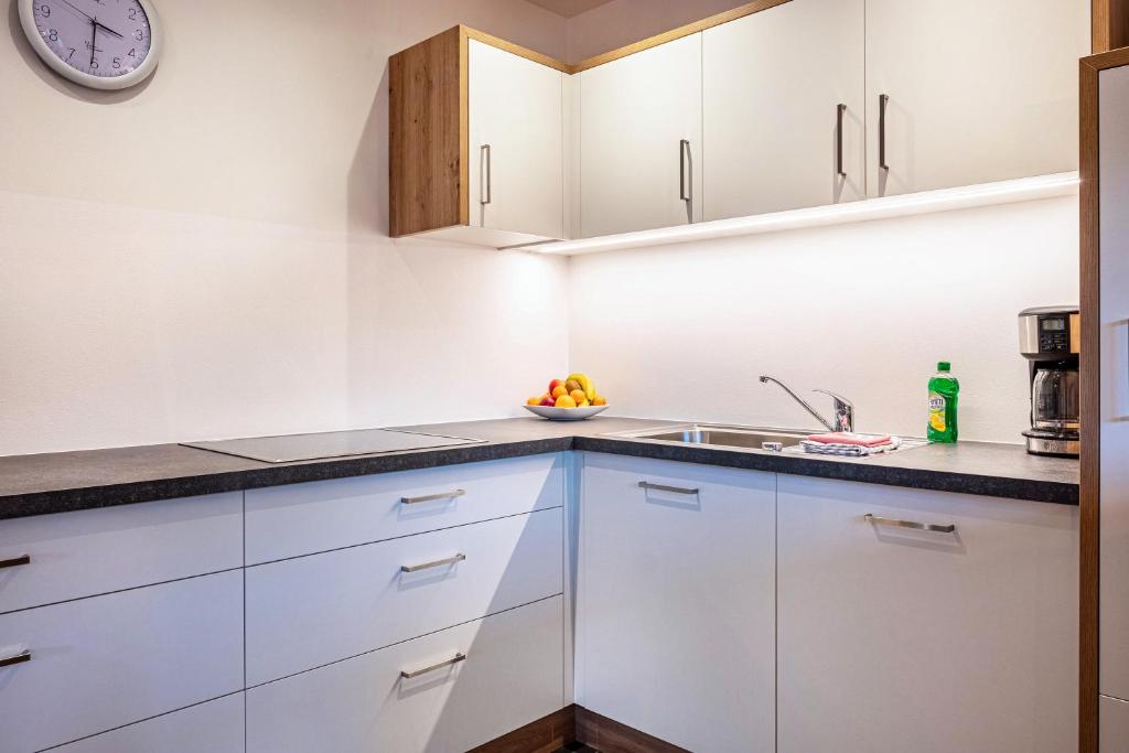 Kuchyň nebo kuchyňský kout v ubytování Mittnackerhof Apartment Kamille