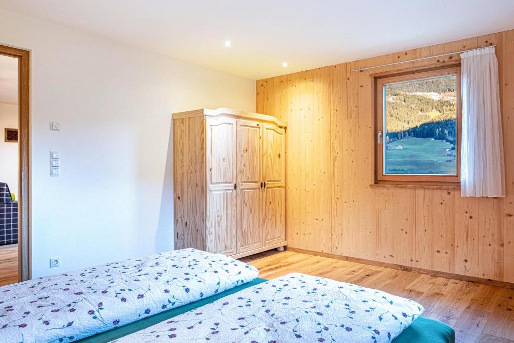Postel nebo postele na pokoji v ubytování Mittnackerhof Apartment Kamille