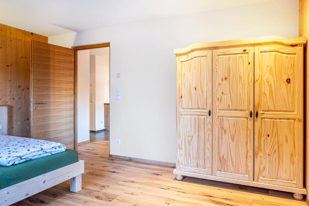 Postel nebo postele na pokoji v ubytování Mittnackerhof Apartment Kamille