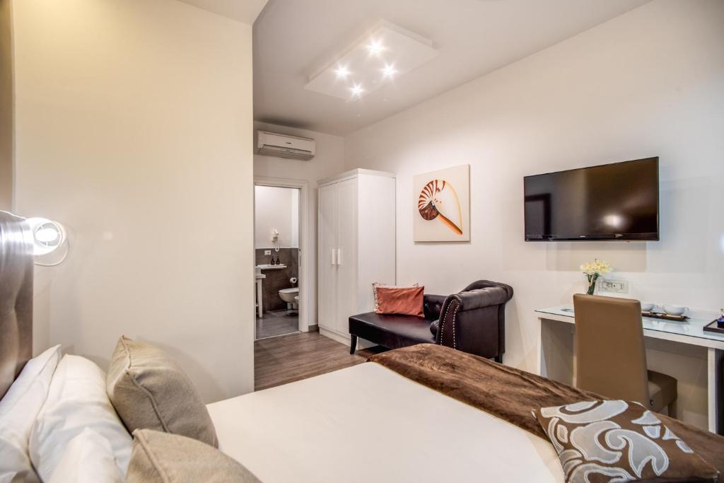 TV a/nebo společenská místnost v ubytování Hotel Sorrento City