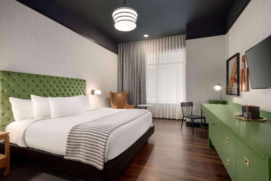 Postel nebo postele na pokoji v ubytování Origin Lexington, a Wyndham Hotel