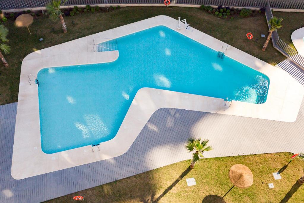 Bazén v ubytovaní Apartamento Málaga Halia alebo v jeho blízkosti