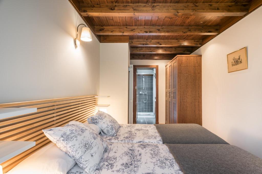 A bed or beds in a room at Tulmas by Totiaran