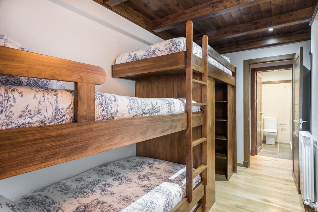 A bed or beds in a room at Tulmas by Totiaran