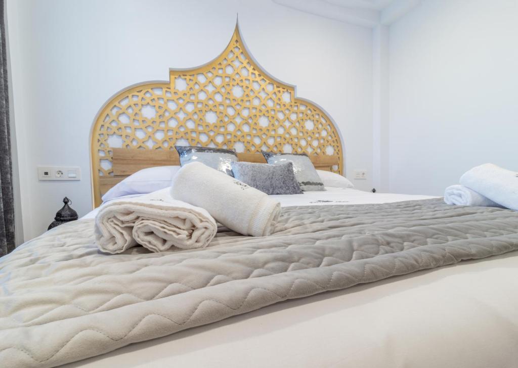 Postel nebo postele na pokoji v ubytování Hotel Reina Aixa