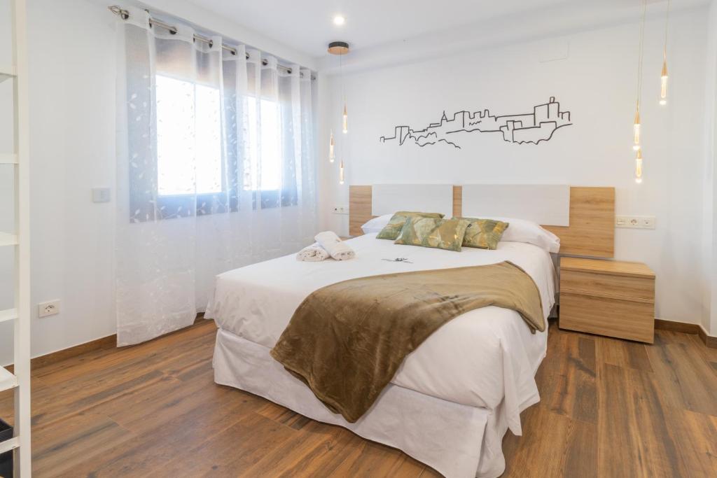Postel nebo postele na pokoji v ubytování Hotel Reina Aixa