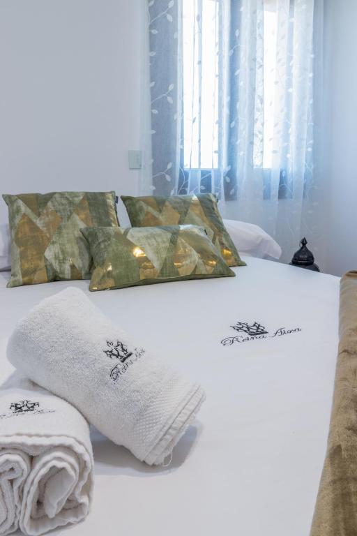 Postel nebo postele na pokoji v ubytování Hotel Reina Aixa