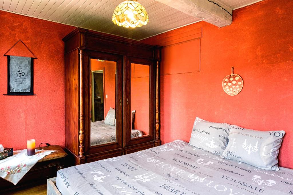 Postel nebo postele na pokoji v ubytování Relax à Maison Sax Kingsize