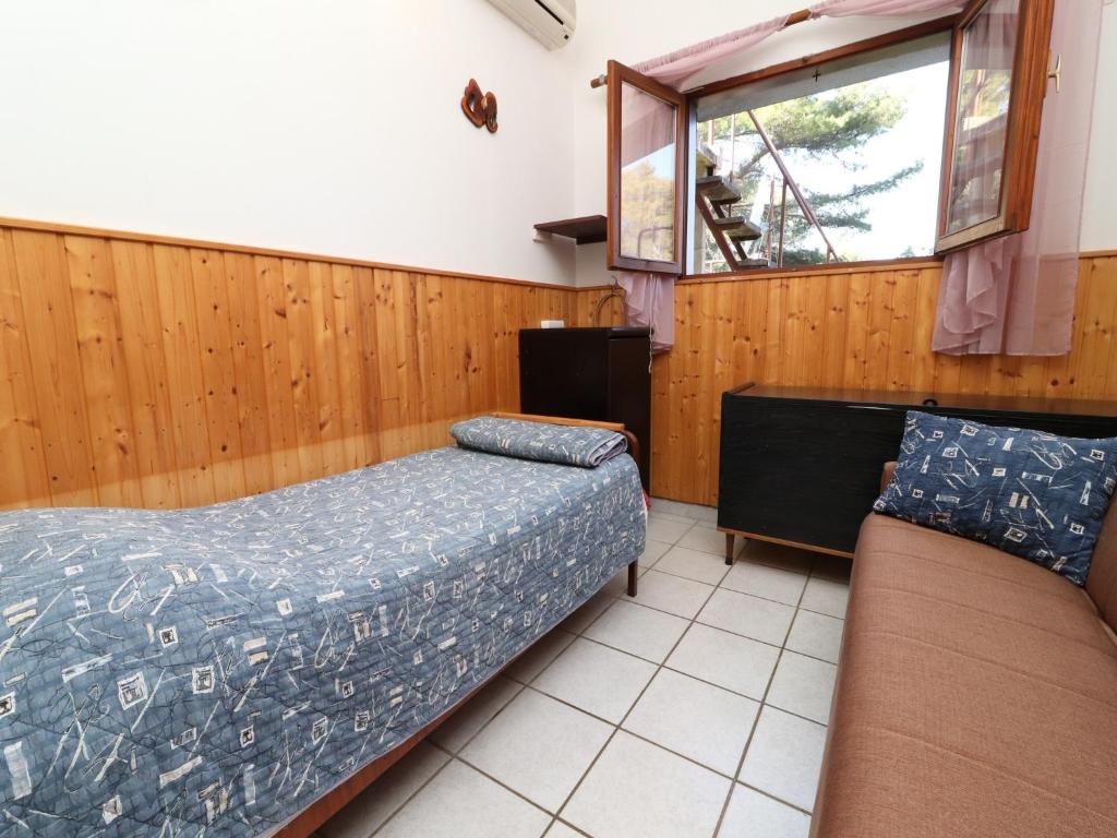 Posteľ alebo postele v izbe v ubytovaní Holiday House Danica