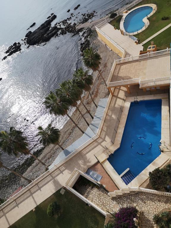 Bazén v ubytovaní Apartamento Benalmádena costa, Torremuelle alebo v jeho blízkosti
