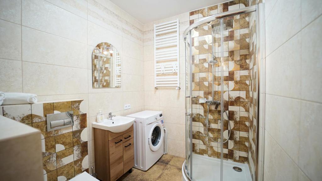 Kúpeľňa v ubytovaní Apartamenty EverySky - Saneczkowa 3