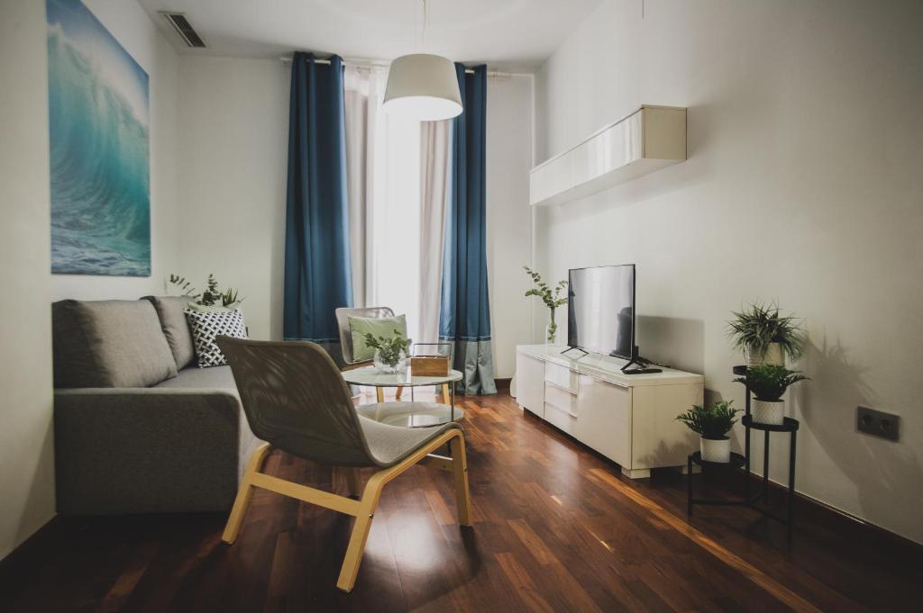 Posezení v ubytování AZZ Sevilla Torre de la Plata Apartamentos
