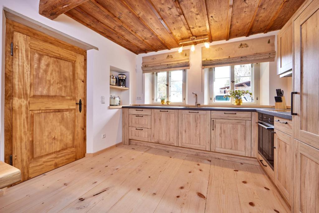 Kuchyň nebo kuchyňský kout v ubytování Haus Hoamat - Almrausch