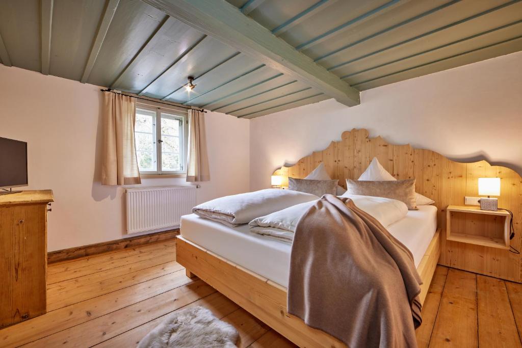 Postel nebo postele na pokoji v ubytování Haus Hoamat - Almrausch