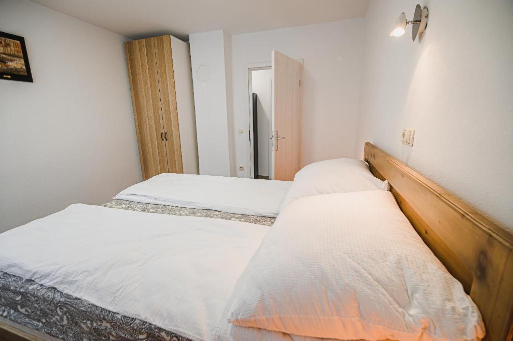 Postel nebo postele na pokoji v ubytování Mojčin Pisker Apartment House