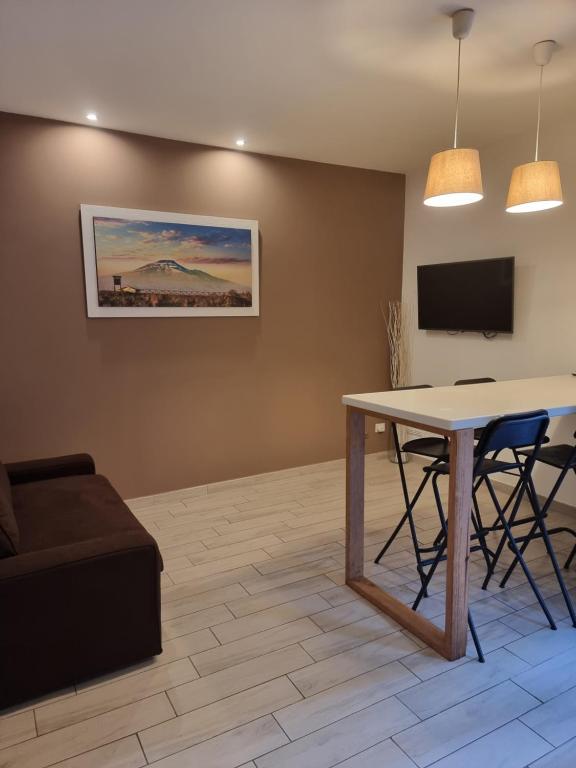 Televízia a/alebo spoločenská miestnosť v ubytovaní GG apartaments