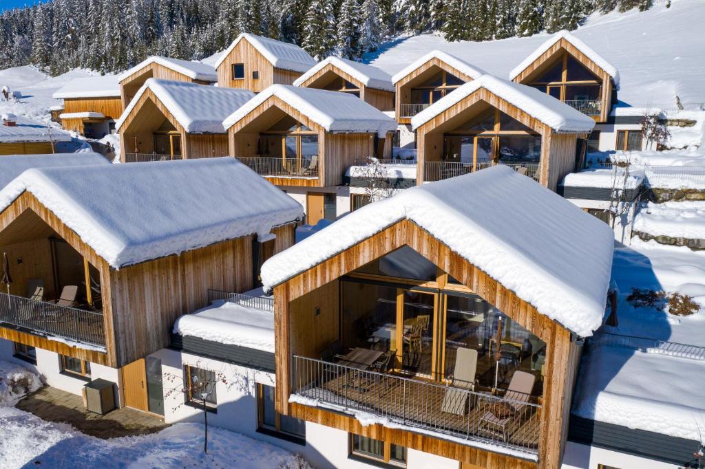 Regitnig - 4 Sterne Hotel und Chalets v zimě