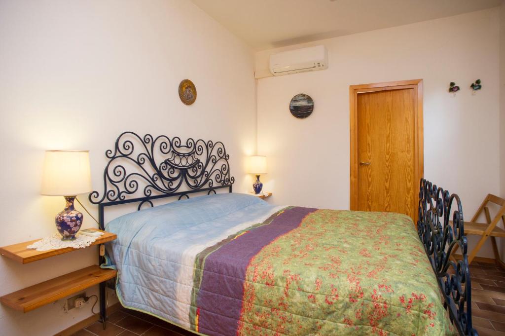 A bed or beds in a room at Villino Norsi