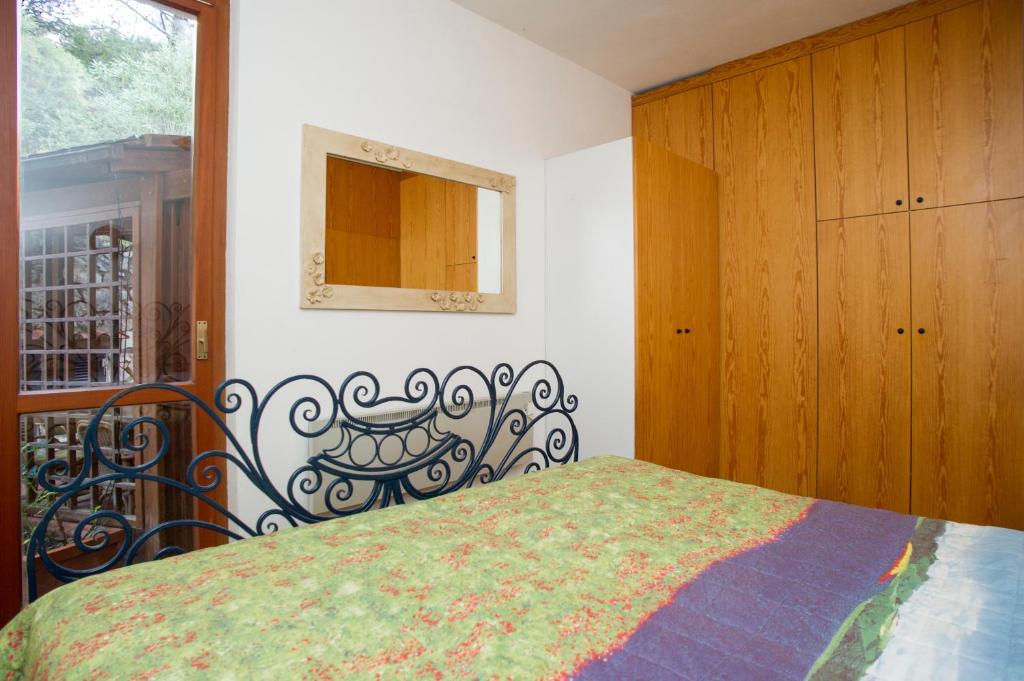 A bed or beds in a room at Villino Norsi