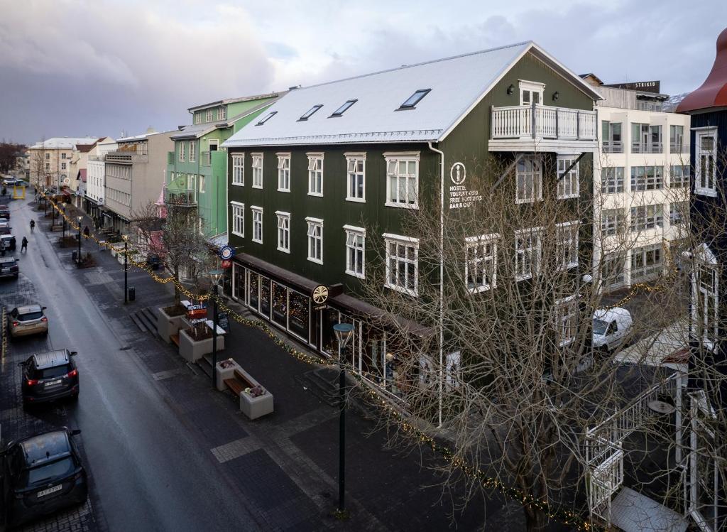 an aerial view of a city with buildings and a street at Akureyri Backpackers in Akureyri