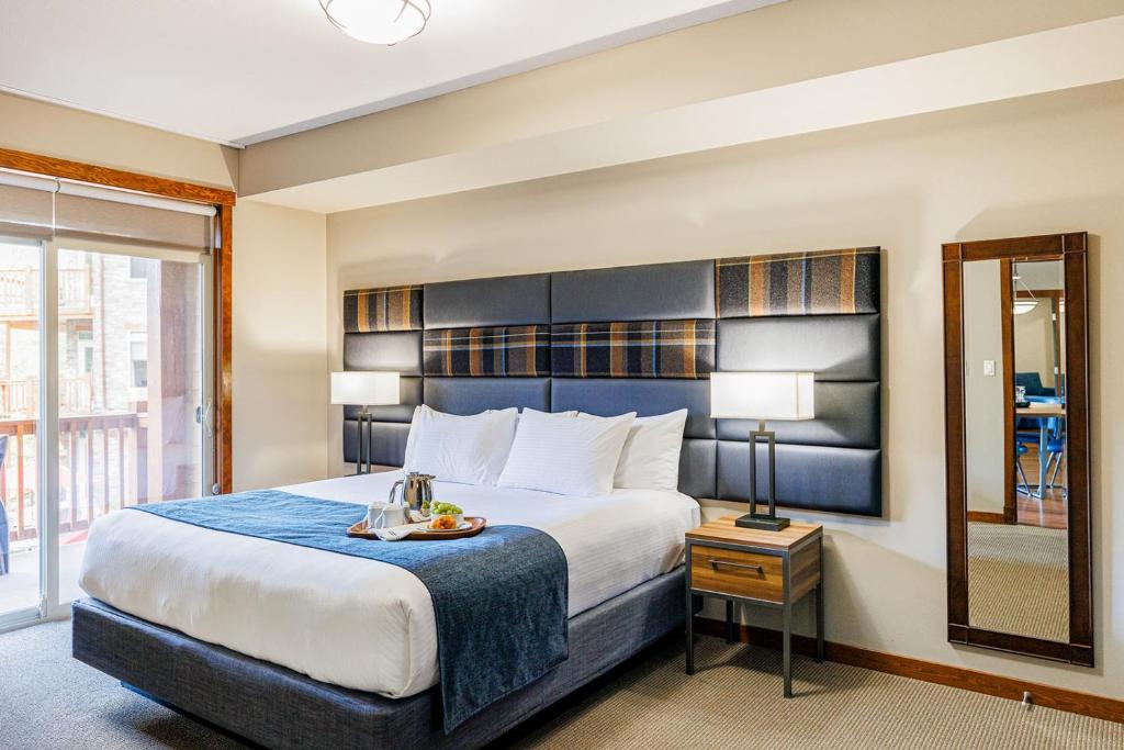 Stoneridge Mountain Resort客房内的一张或多张床位
