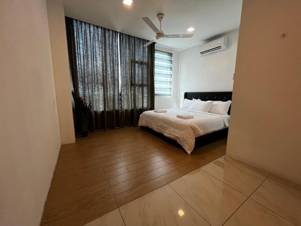 Postel nebo postele na pokoji v ubytování ITCC Manhattan Suites by PRIME