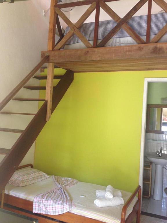 Letto o letti in una camera di Hospedagem Recanto dos Ties