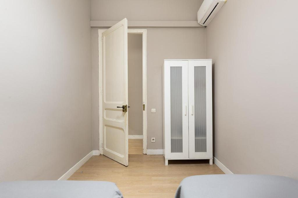 Postel nebo postele na pokoji v ubytování Sagrada Familia I by Enjoy Apartments