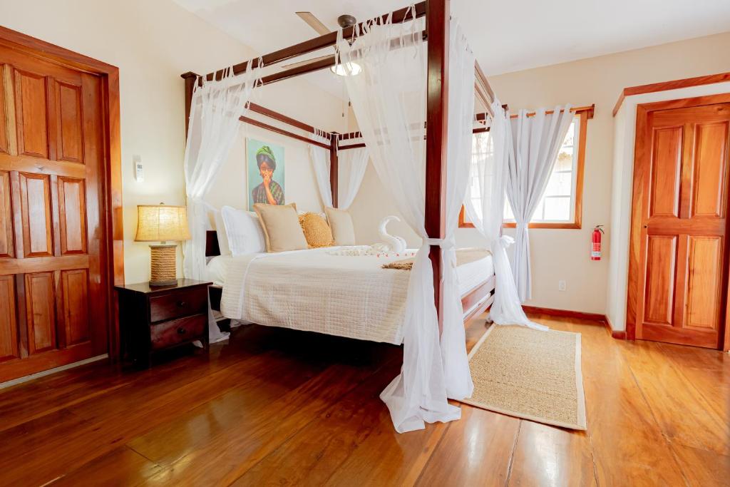 Postel nebo postele na pokoji v ubytování Hidden Jewel Boutique Hotel