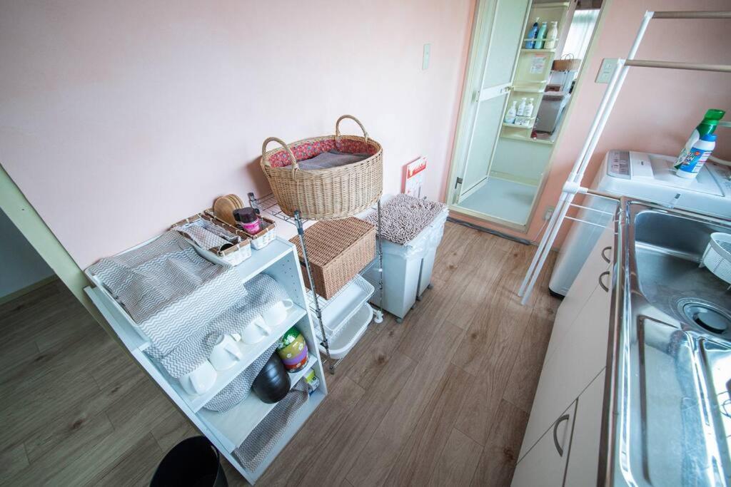 Kuchyň nebo kuchyňský kout v ubytování Otaru Shikkui Cottage