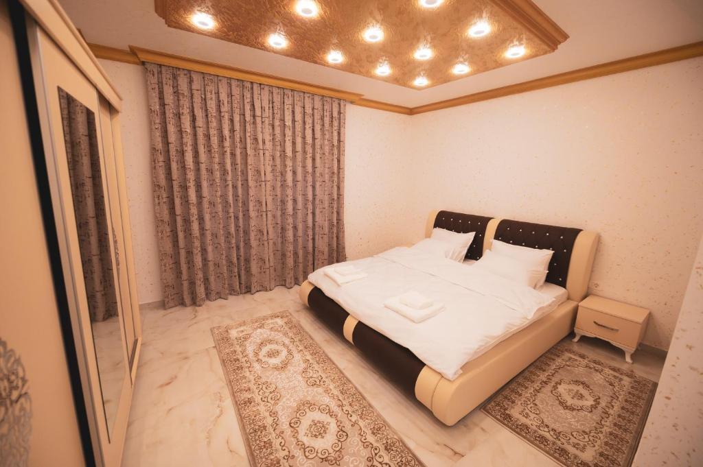Postel nebo postele na pokoji v ubytování Hotel Premium