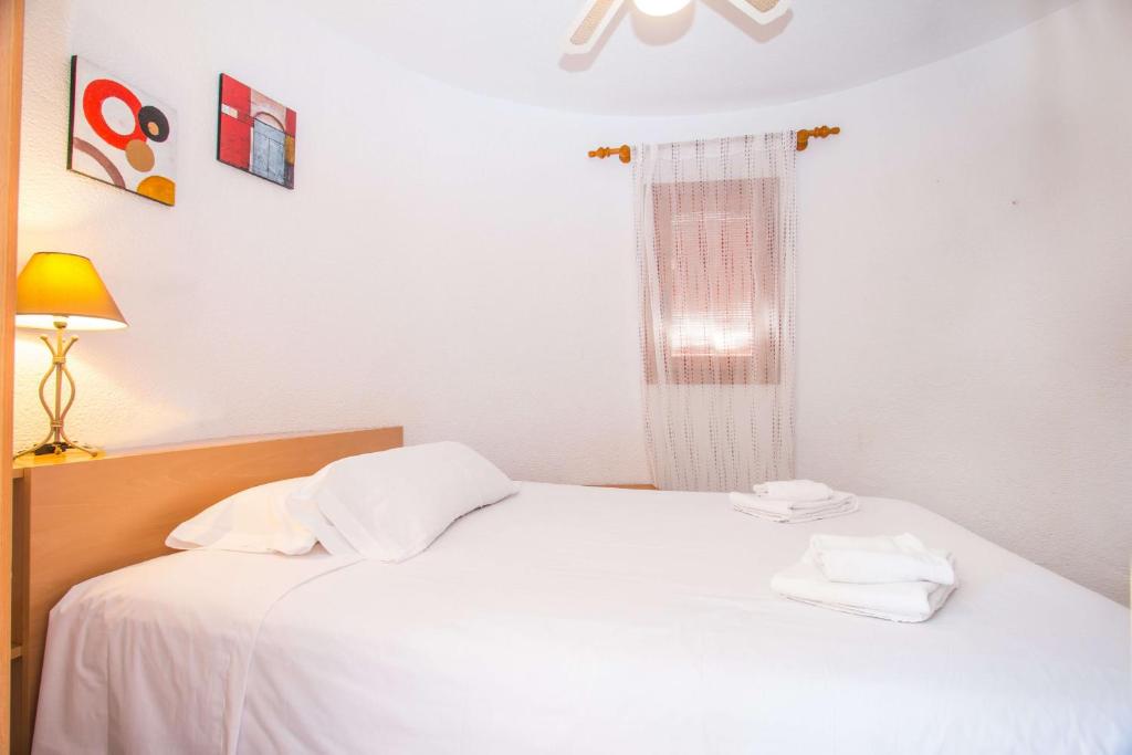 A bed or beds in a room at Villa Erik - PlusHolidays