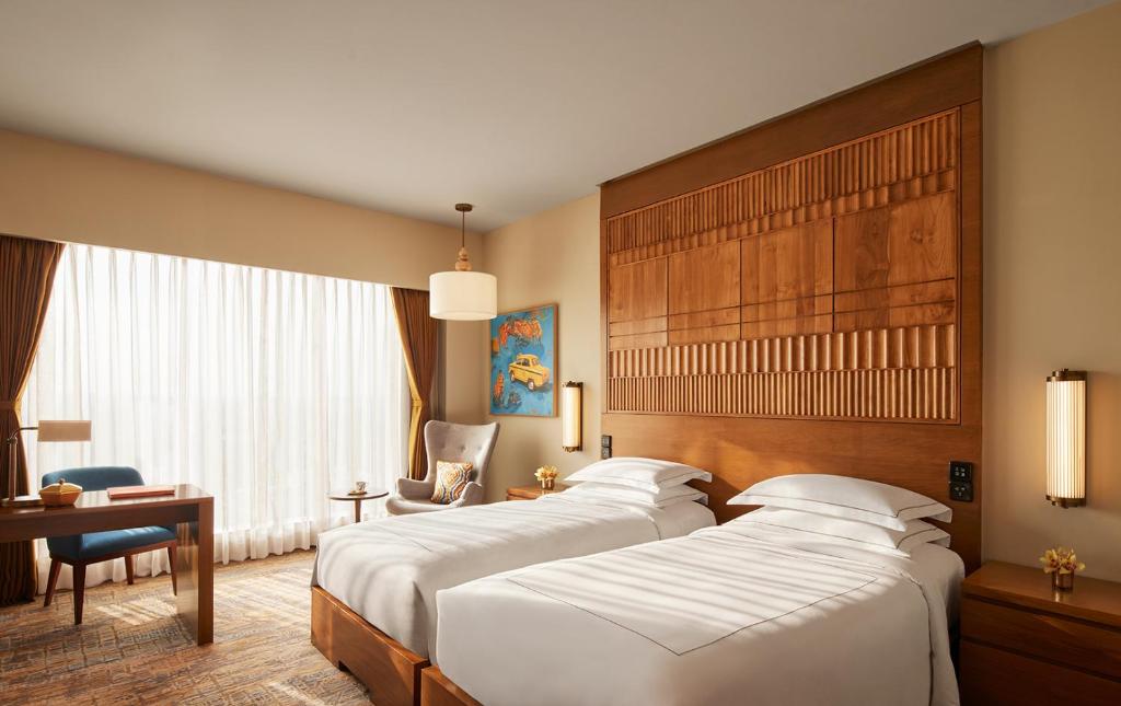 Taj City Centre New Town, Kolkata - Luxuszimmer Doppelbett