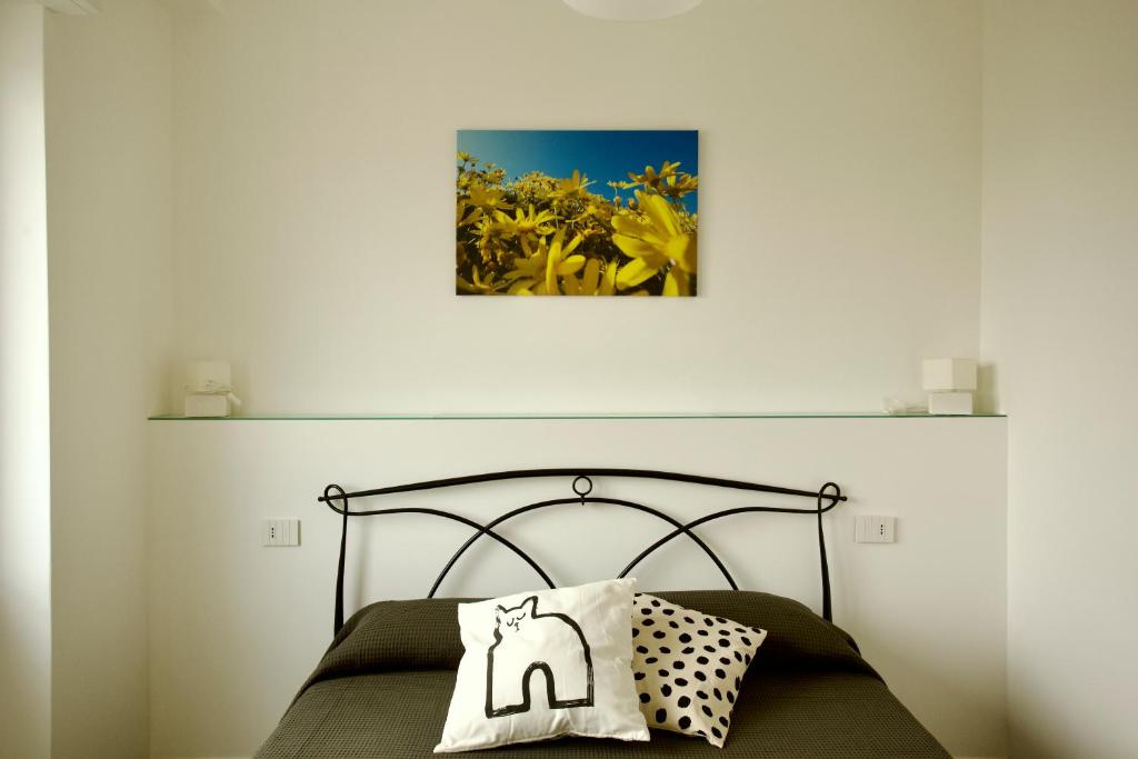 Łóżko lub łóżka w pokoju w obiekcie M&Mapartments