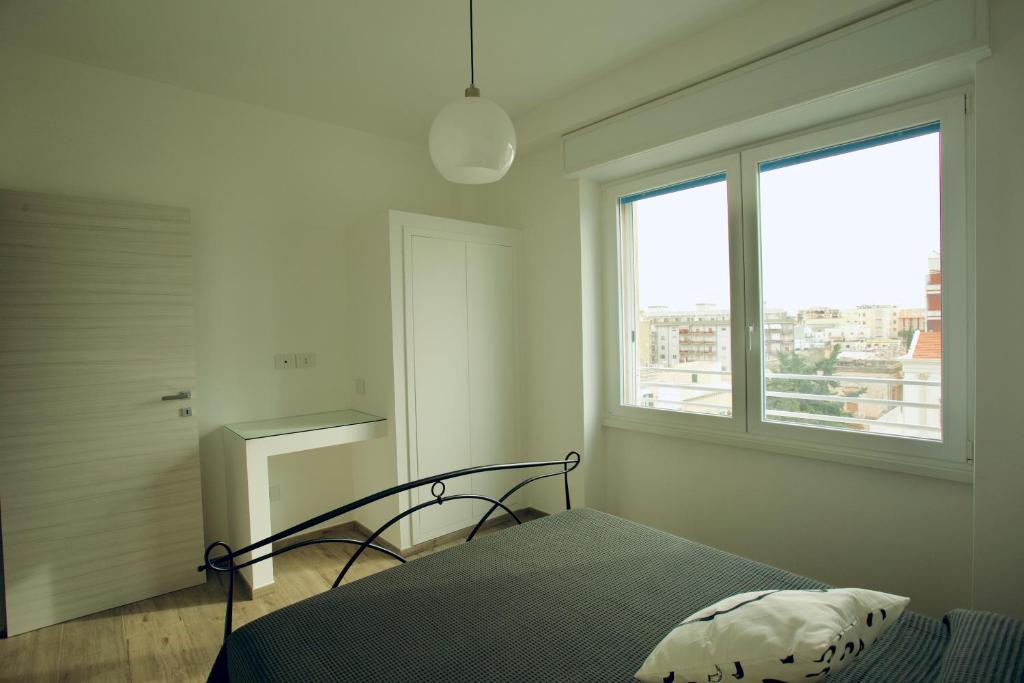 Łóżko lub łóżka w pokoju w obiekcie M&Mapartments