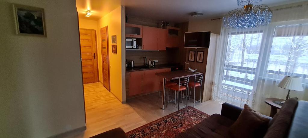 Kuchyň nebo kuchyňský kout v ubytování Apartamentai pas Danutę