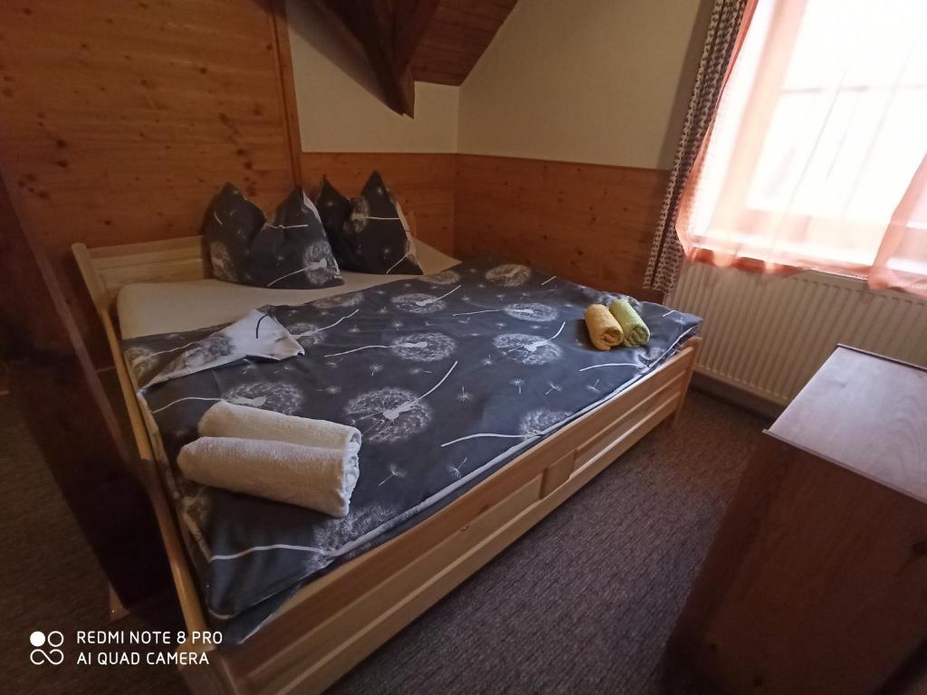 Łóżko lub łóżka w pokoju w obiekcie Penzion Avalanche