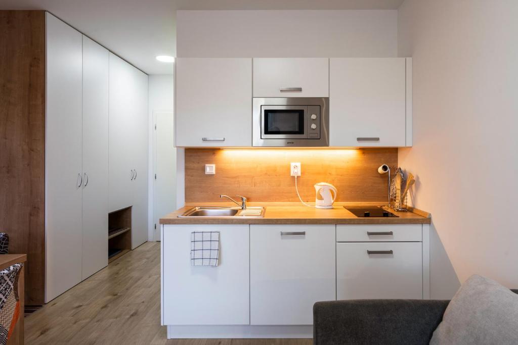 Kuchyň nebo kuchyňský kout v ubytování Apartmán 101 Vila Zuberec